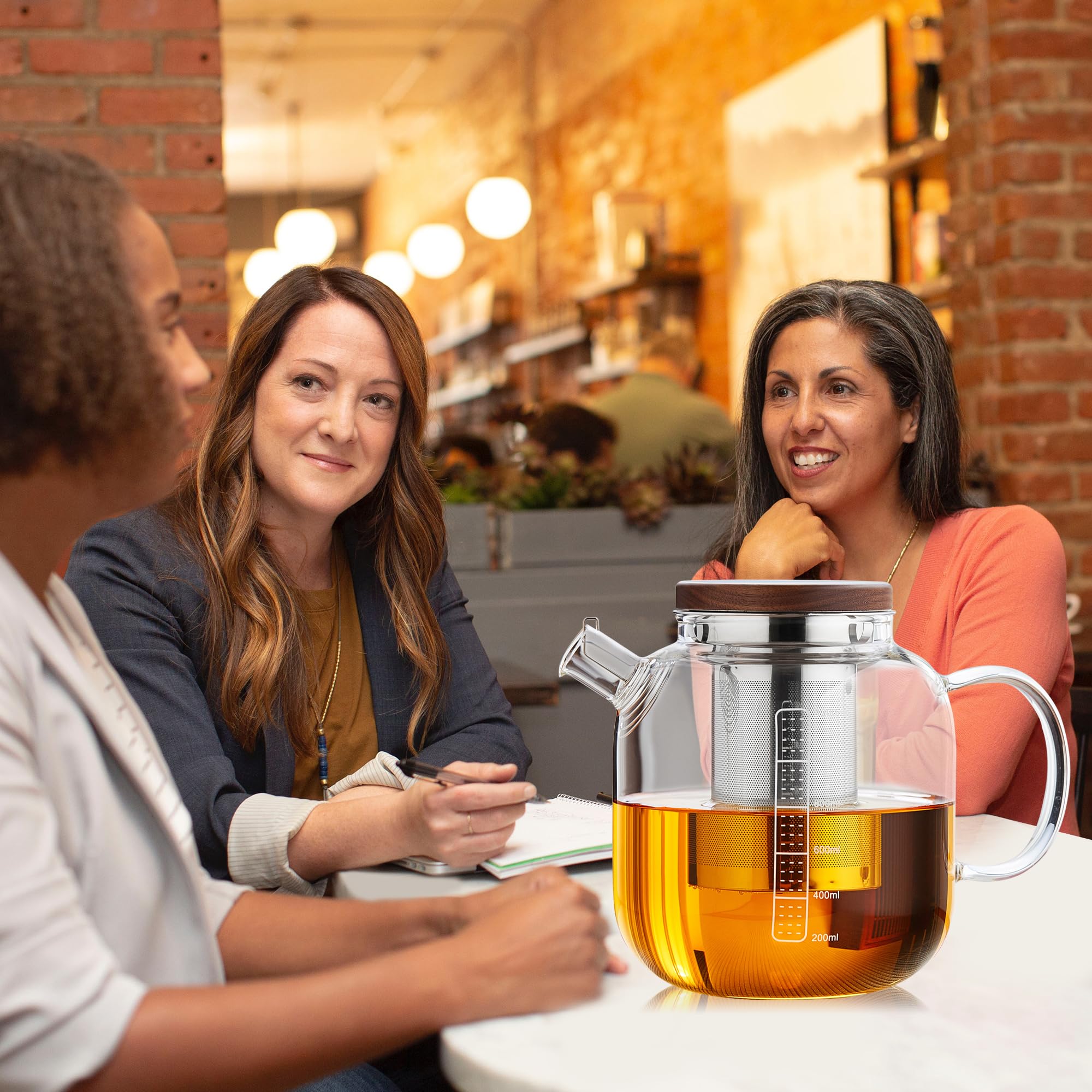 MESNEY teapot in a tea setting showing aesthetic and sharing benefit