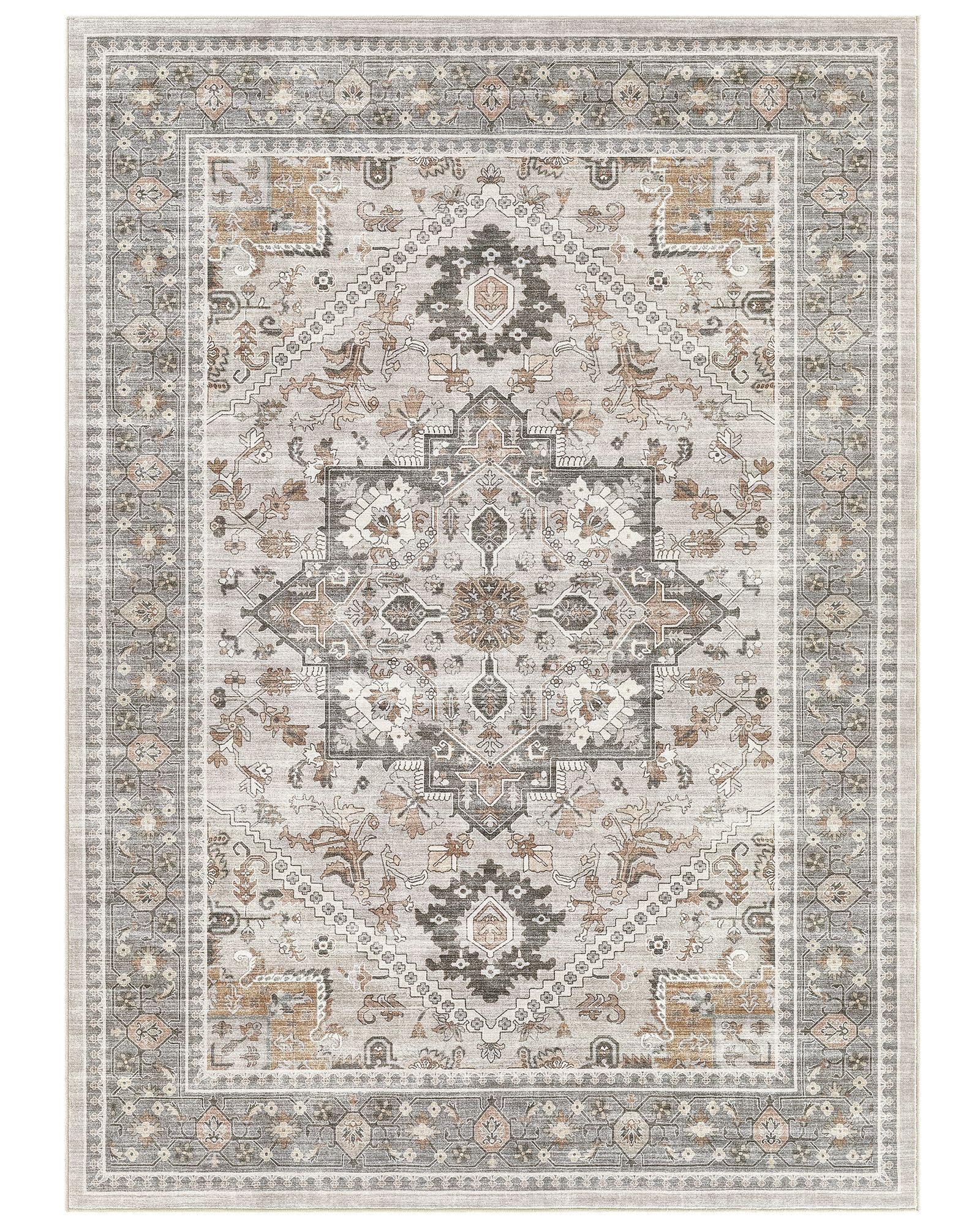 Micgeek rug next to sofa and coffee table showing true 9x12 scale and placement benefit