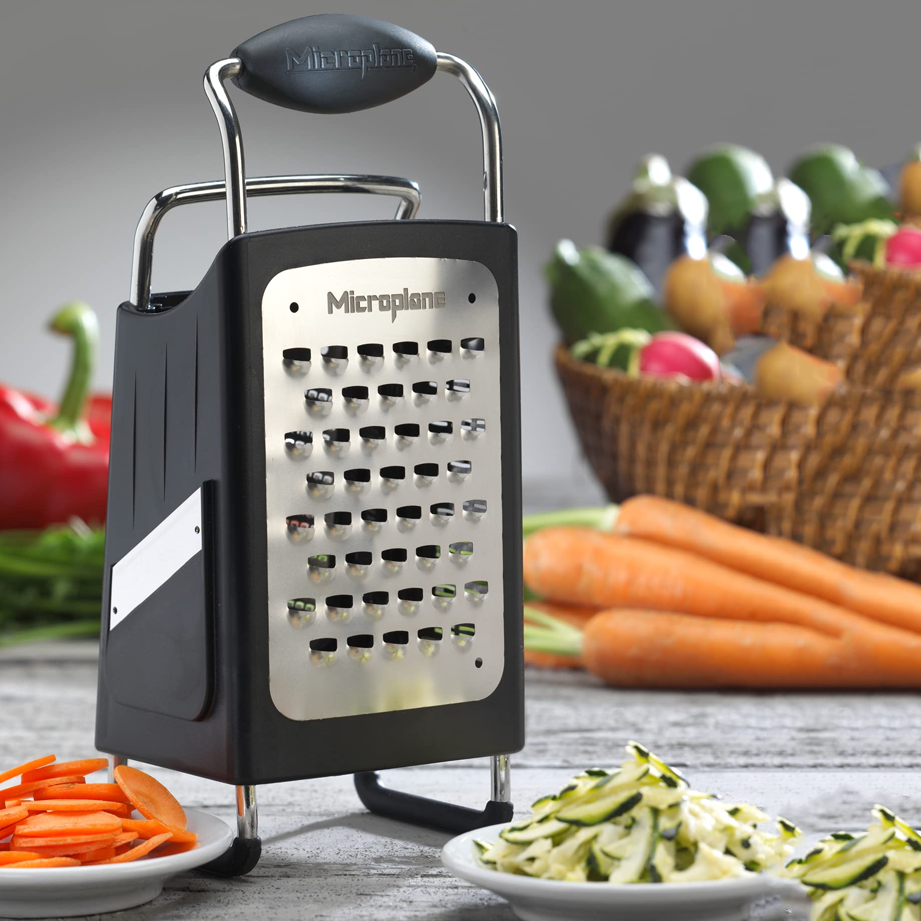 Microplane grating fresh cheddar cheese cleanly for quick meal prep