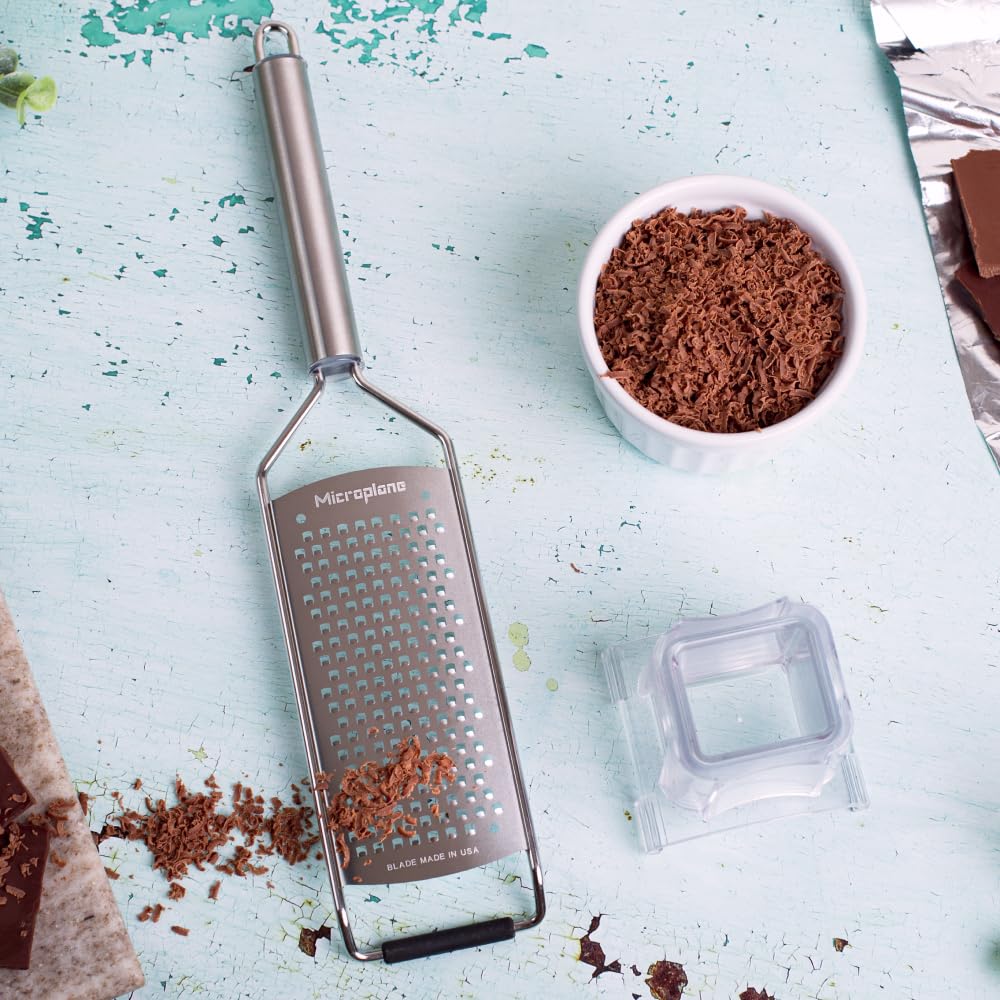 Microplane size comparison on countertop showing compact storage benefit