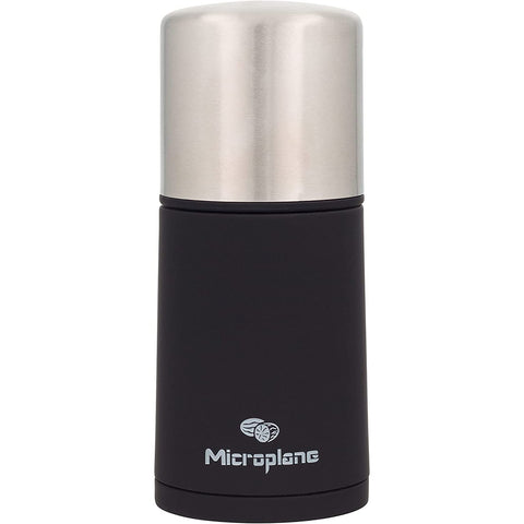 Microplane spice mill front view showing sleek stainless design and easy grip benefit