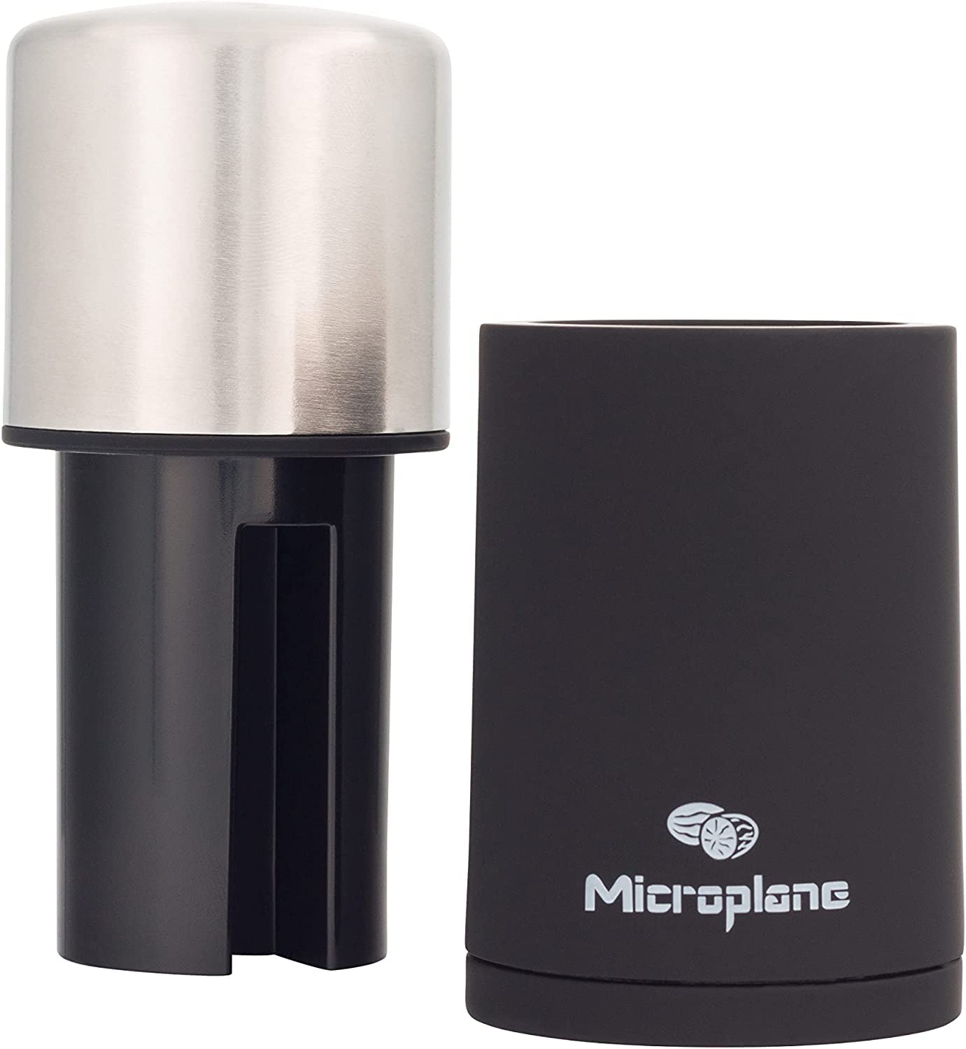 Microplane grating cinnamon stick into bowl for immediate aroma boost in recipes