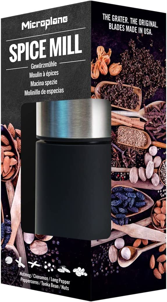 Microplane mill top storage open with whole spices visible for convenient freshness