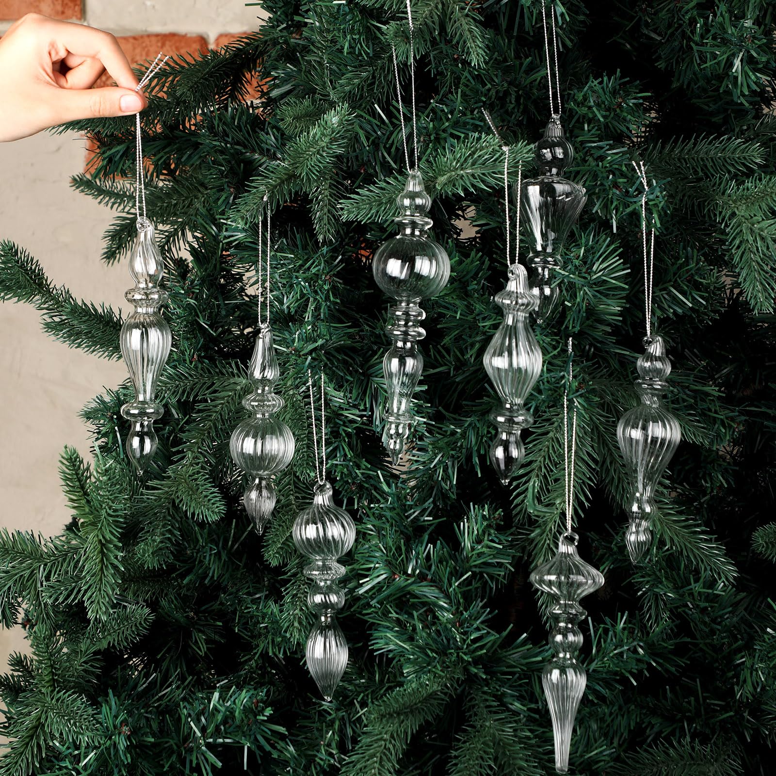 Mifoci finial beside a ruler showing 15 cm length for size clarity
