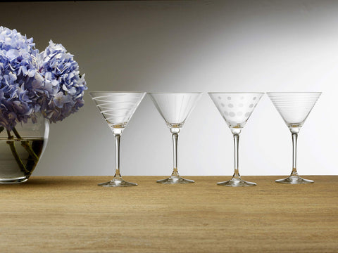 Mikasa Cheers glass with cocktail and olives illustrating generous capacity and garnish space