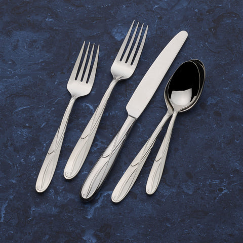 Mikasa Cocoa Blossom utensils inside dishwasher rack showing easy cleanup and dishwasher-safe convenience