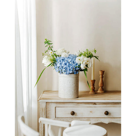MIKIGEY styled as a vase with flowers, demonstrates multifunctional decorative use