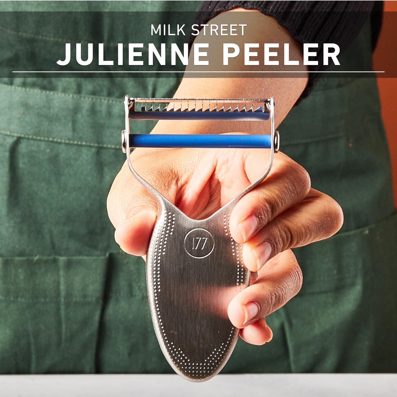 Milk Street julienne peeler close-up of replaceable stainless blade for consistent, sharp julienne cuts