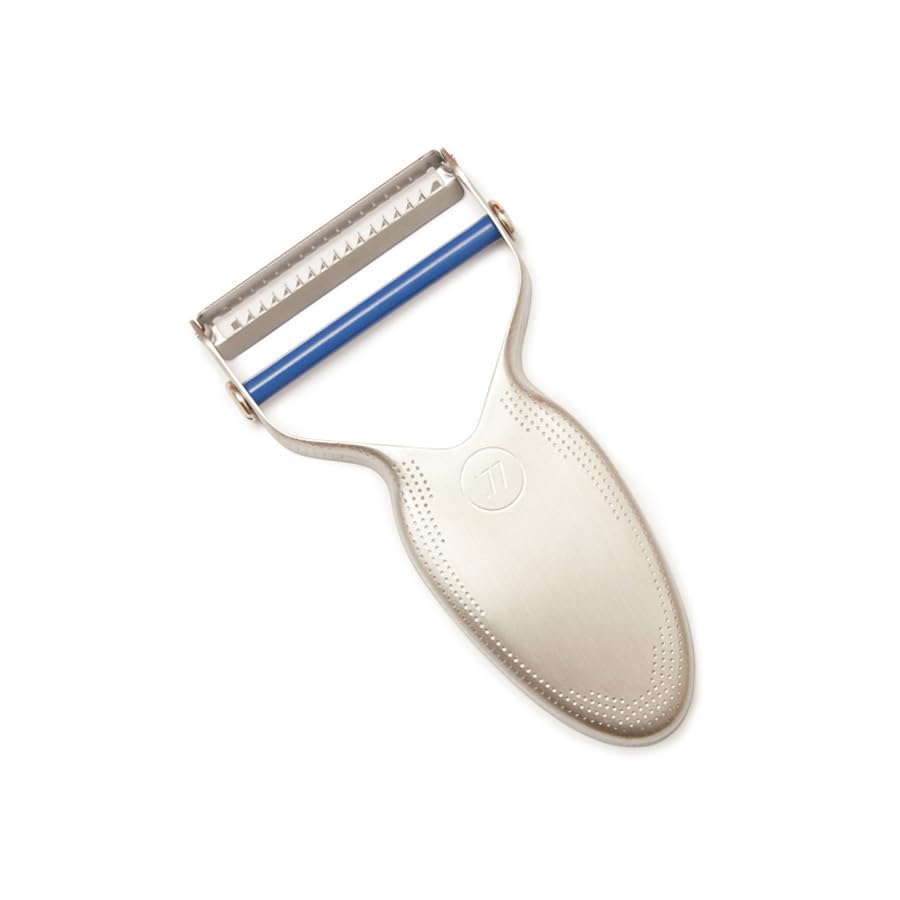 Milk Street julienne peeler front view showing stainless steel and ergonomic handle for lasting performance