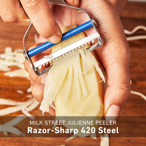 Milk Street julienne peeler handle detail showing contoured grip to reduce hand fatigue