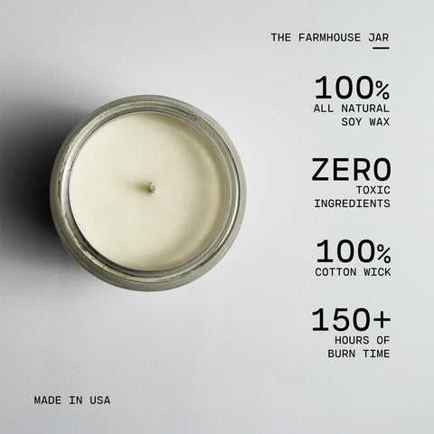 Milkhouse candle lit in living room providing cozy ambient fragrance