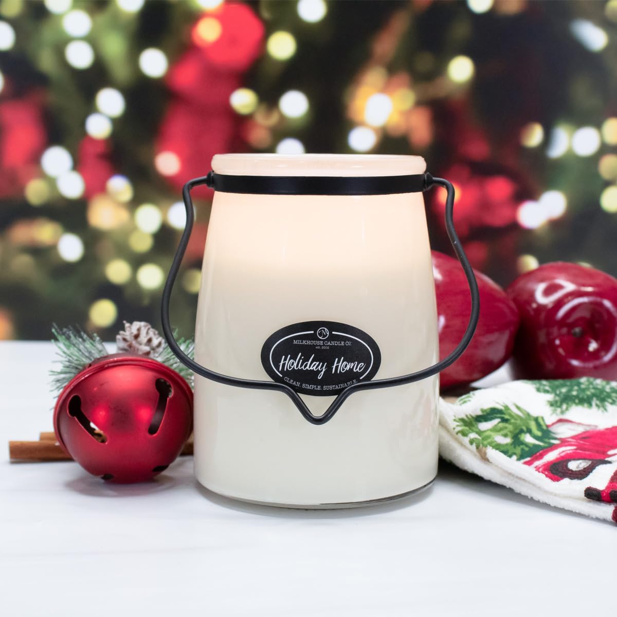 Milkhouse Holiday Home ingredients flatlay with apples and cinnamon evoking scent