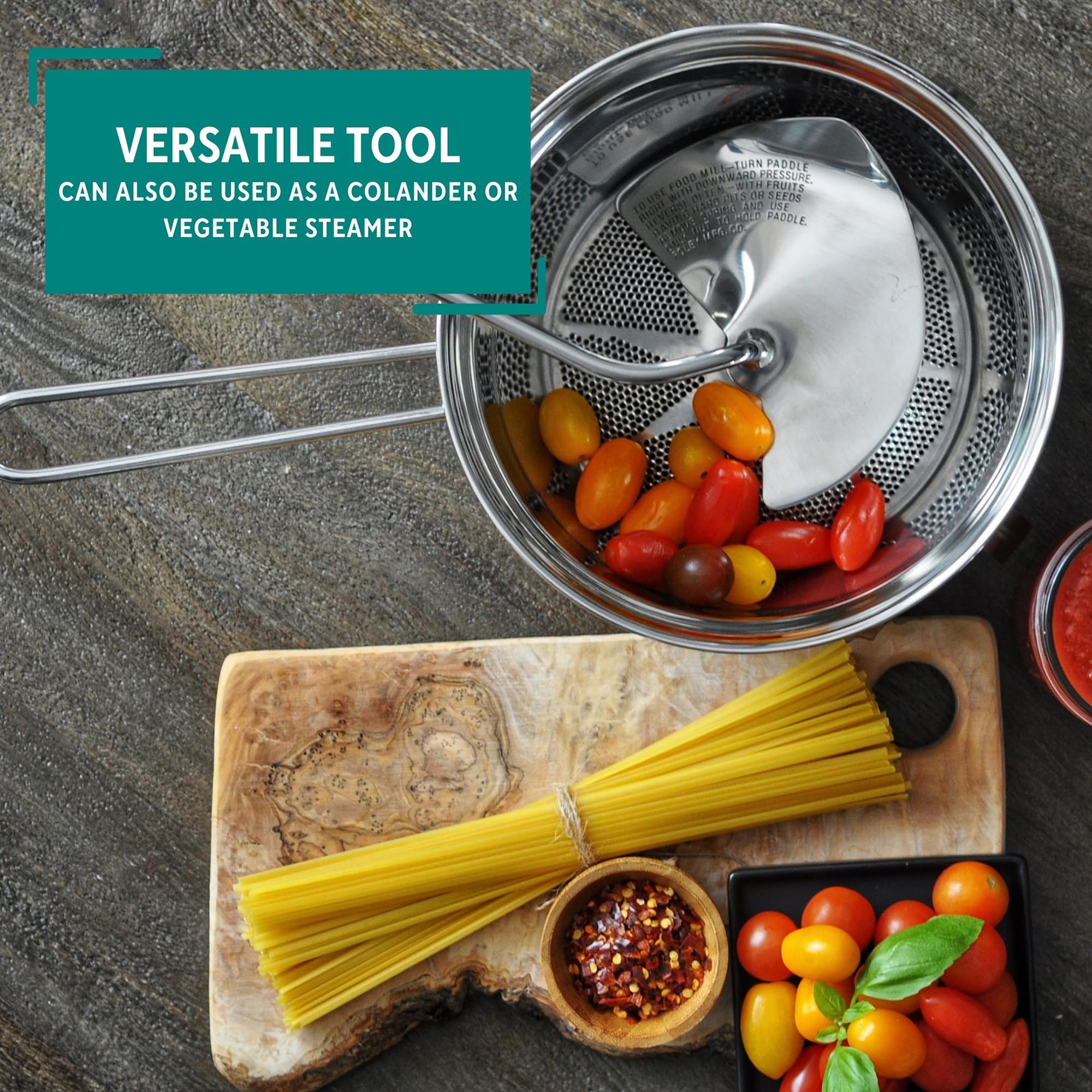 Mirro in use processing tomatoes to create smooth, seed-free sauce