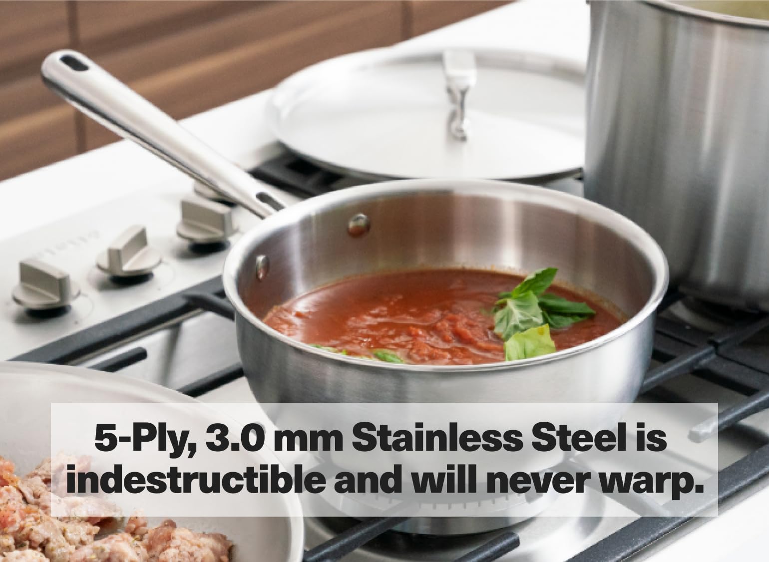 Misen saucier on stovetop in use for efficient sauce reduction benefit