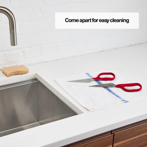 Misen shears in use deboning chicken showing strong blades for kitchen tasks