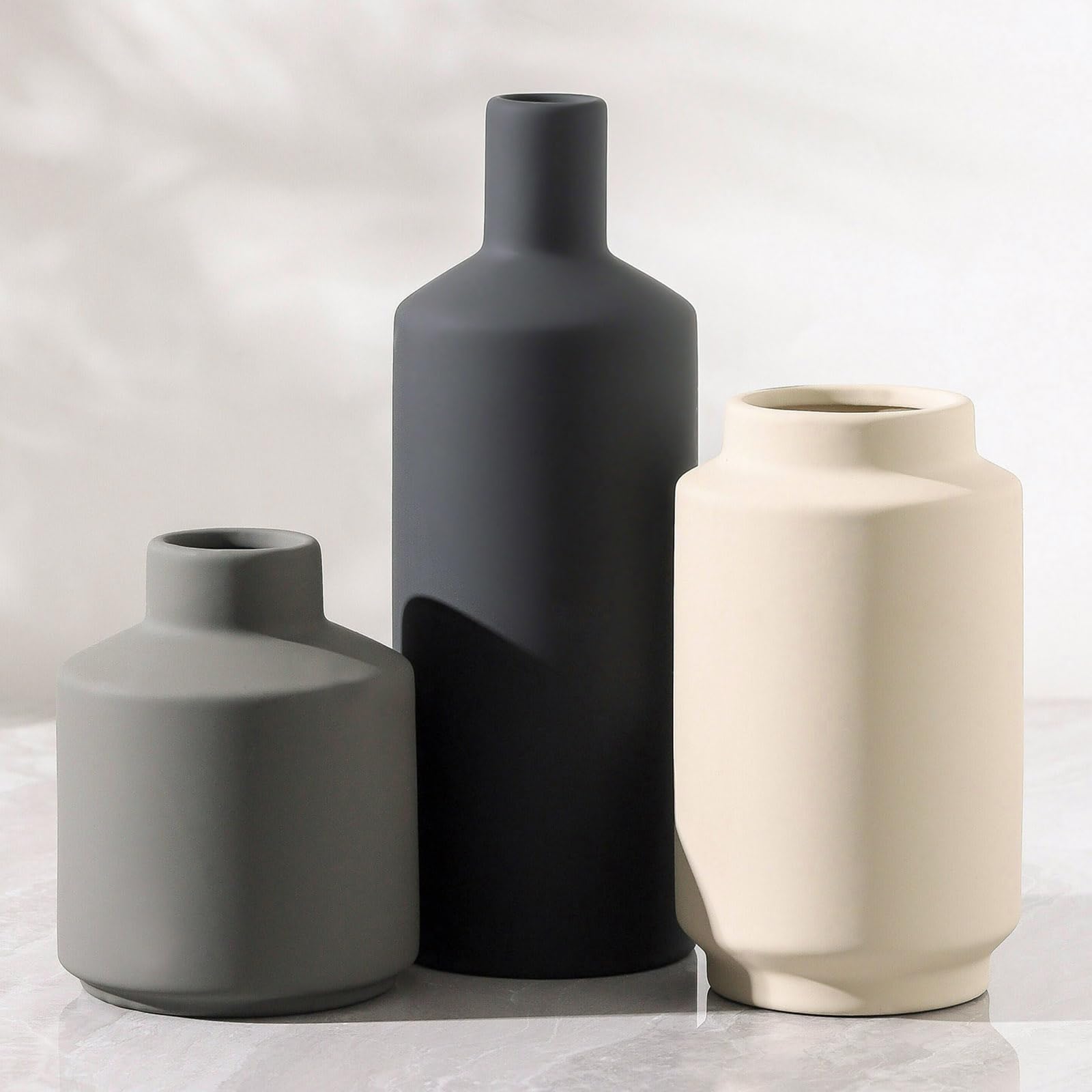Mitt&Ditt front view of three ceramic vases showing cohesive neutral styling and balance