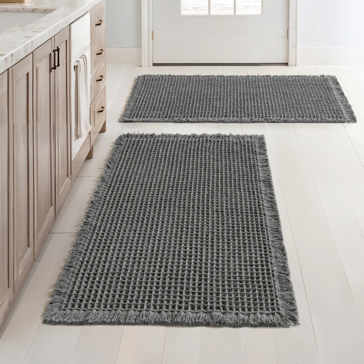 MIULEE front view of two dark grey waffle bath mats showing coverage and style