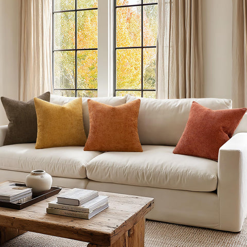 MIULEE styled on a sofa illustrating cozy fall layering and visual warmth