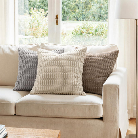 MIULEE pair on sofa creating layered, cozy living room styling