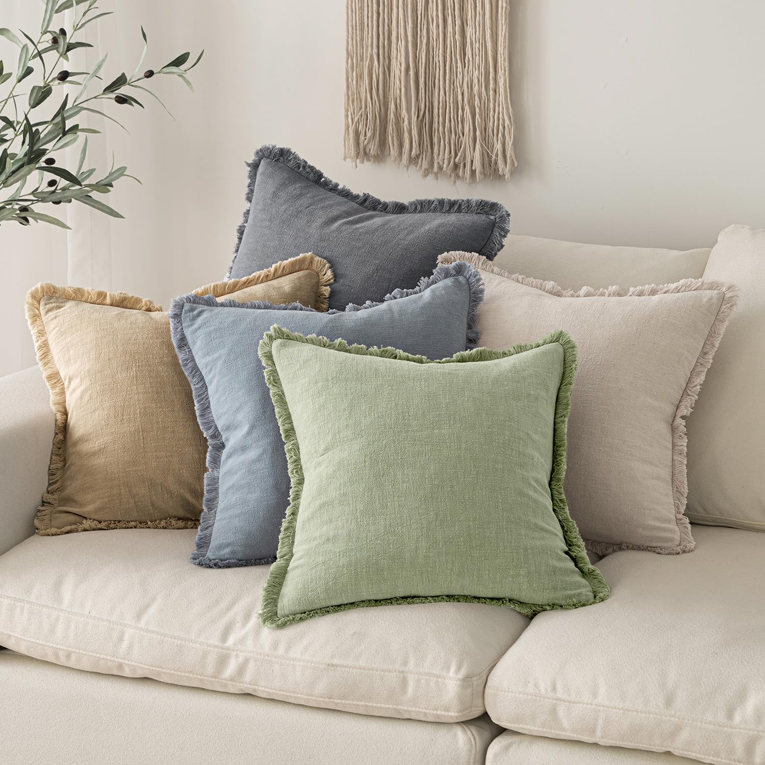 MIULEE pillow next to ruler showing 20x20 size and fit guidance