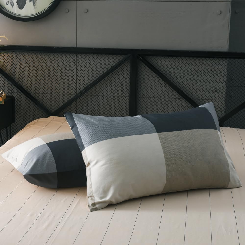 mixinni styled bedroom with comforter illustrating fresh, modern sleep space