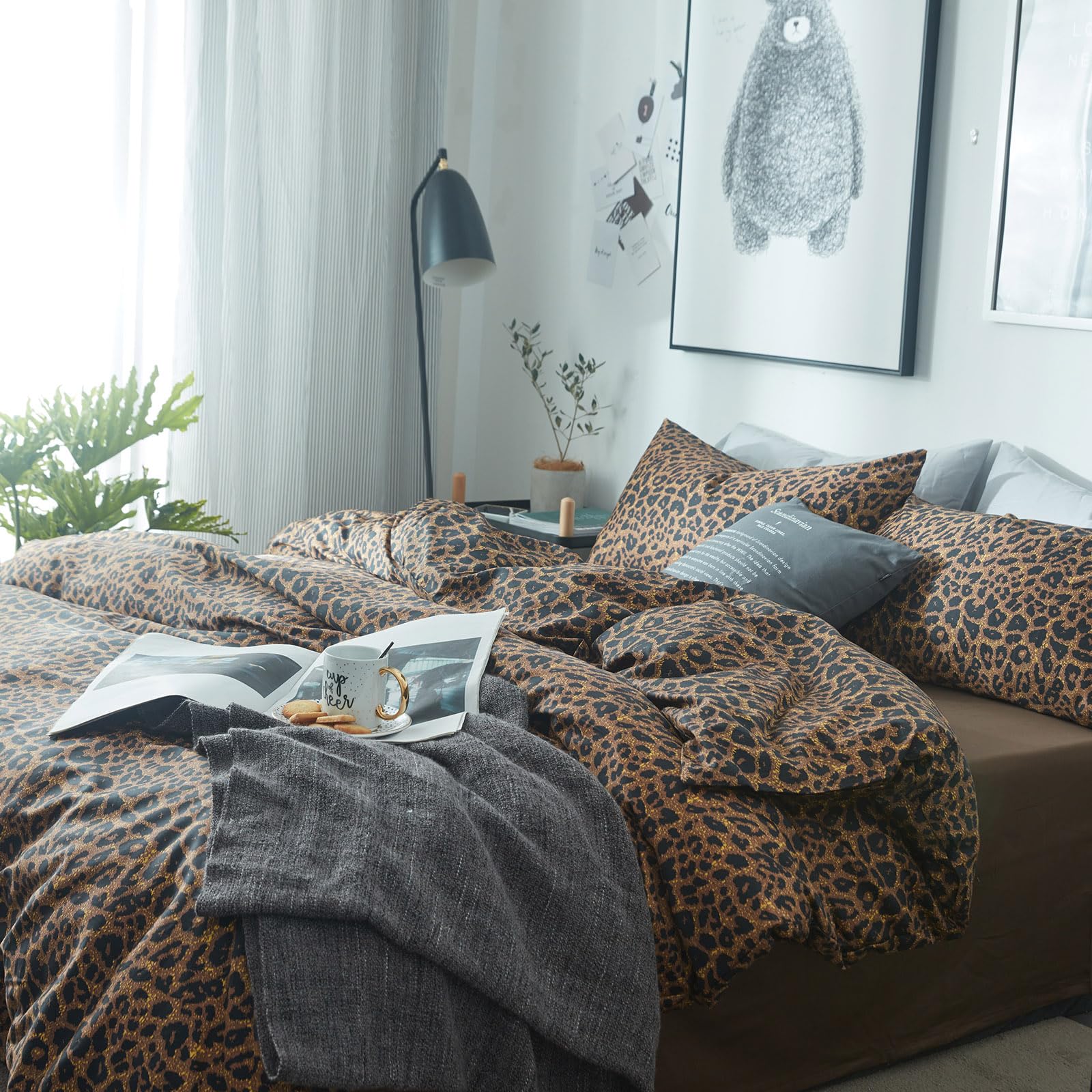 mixinni styled bedroom with comforter showing chic animal print and cozy vibe