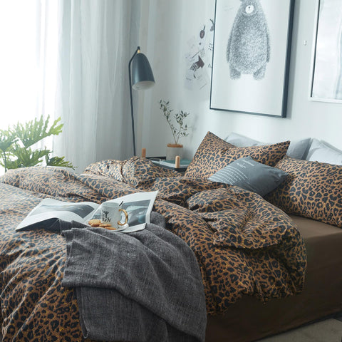 mixinni styled bedroom with comforter showing chic animal print and cozy vibe