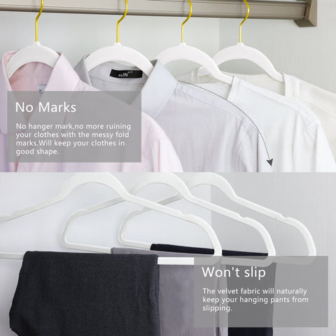 MIZGI hangers holding suits and coats to demonstrate strong heavy-duty support