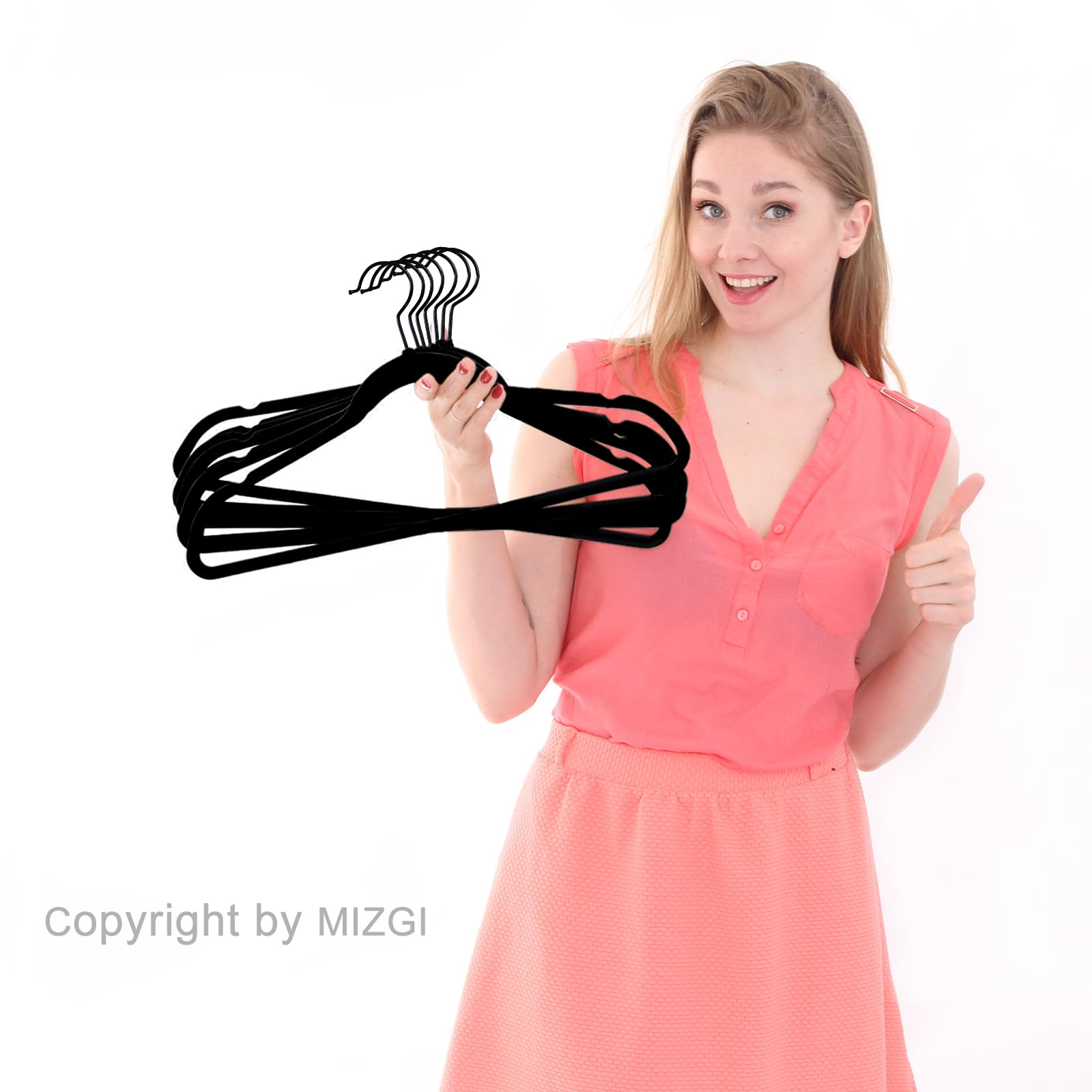MIZGI bedroom scene with hangers creating tidy, boutique-style closet