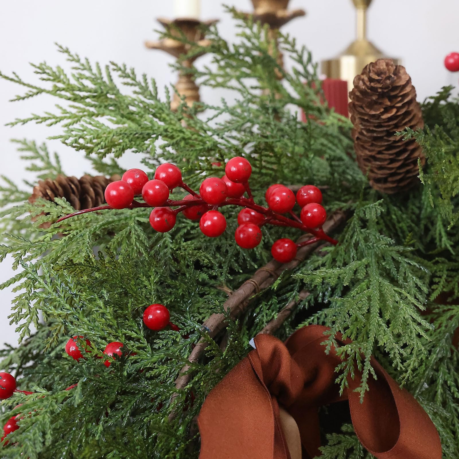 MIZII garland styled on a mantel showing how it dresses a fireplace benefit