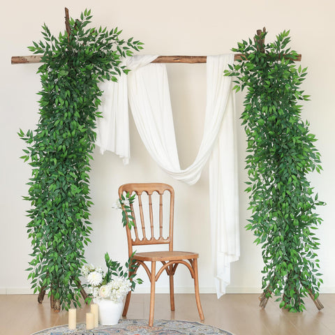 mizii ruscus arranged in a table centerpiece providing instant table coverage