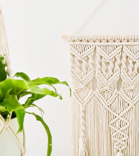 Mkono hangings beside sofa showing scale and how they soften living spaces
