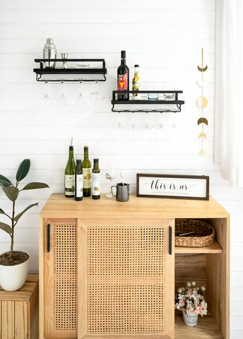 mkono shelf with bottles and glasses showing organized wine display benefit