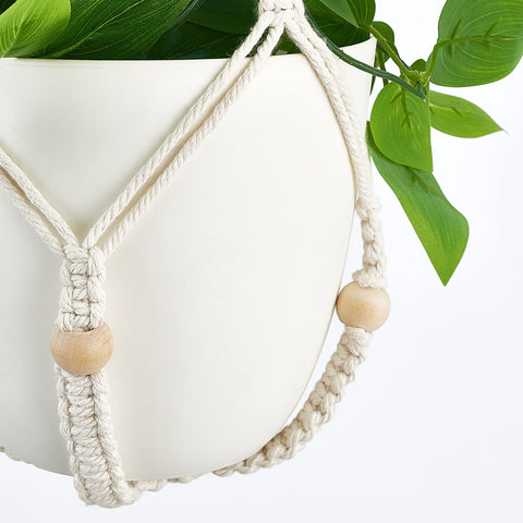 Mkono two-piece set packed showing included pot hanger and faux vines for quick setup