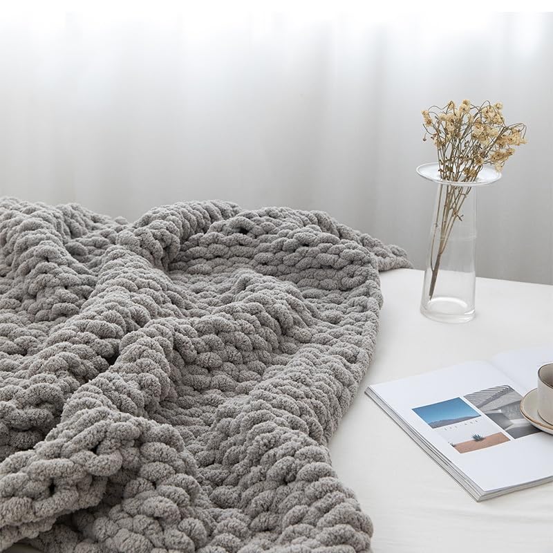 MocaDng throw draped over a sofa adding style and immediate warmth