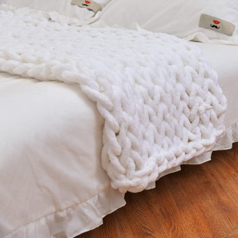 MocaDng front view of folded chunky knit throw showing design and cozy appeal