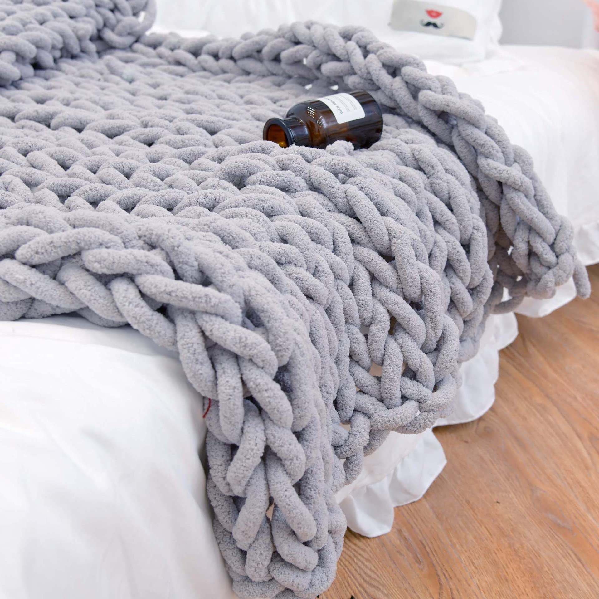 MocaDng front view showing blanket folded, highlights brand and cozy appeal