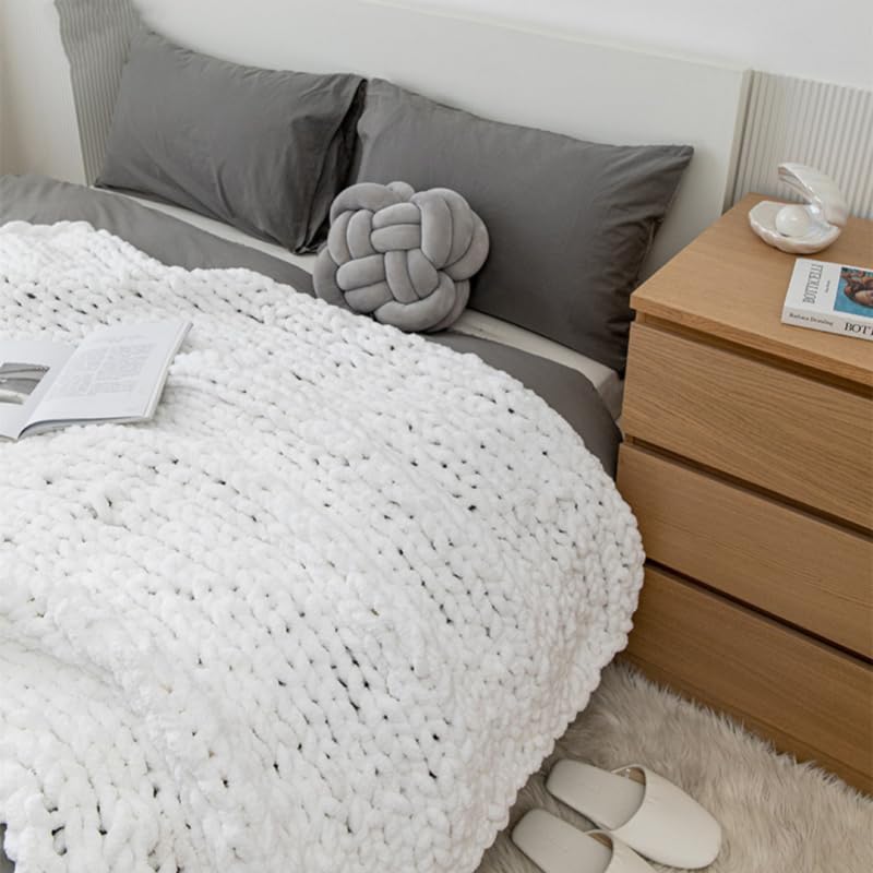 MocaDng blanket on picnic outdoors showing portable warmth and stylish layering