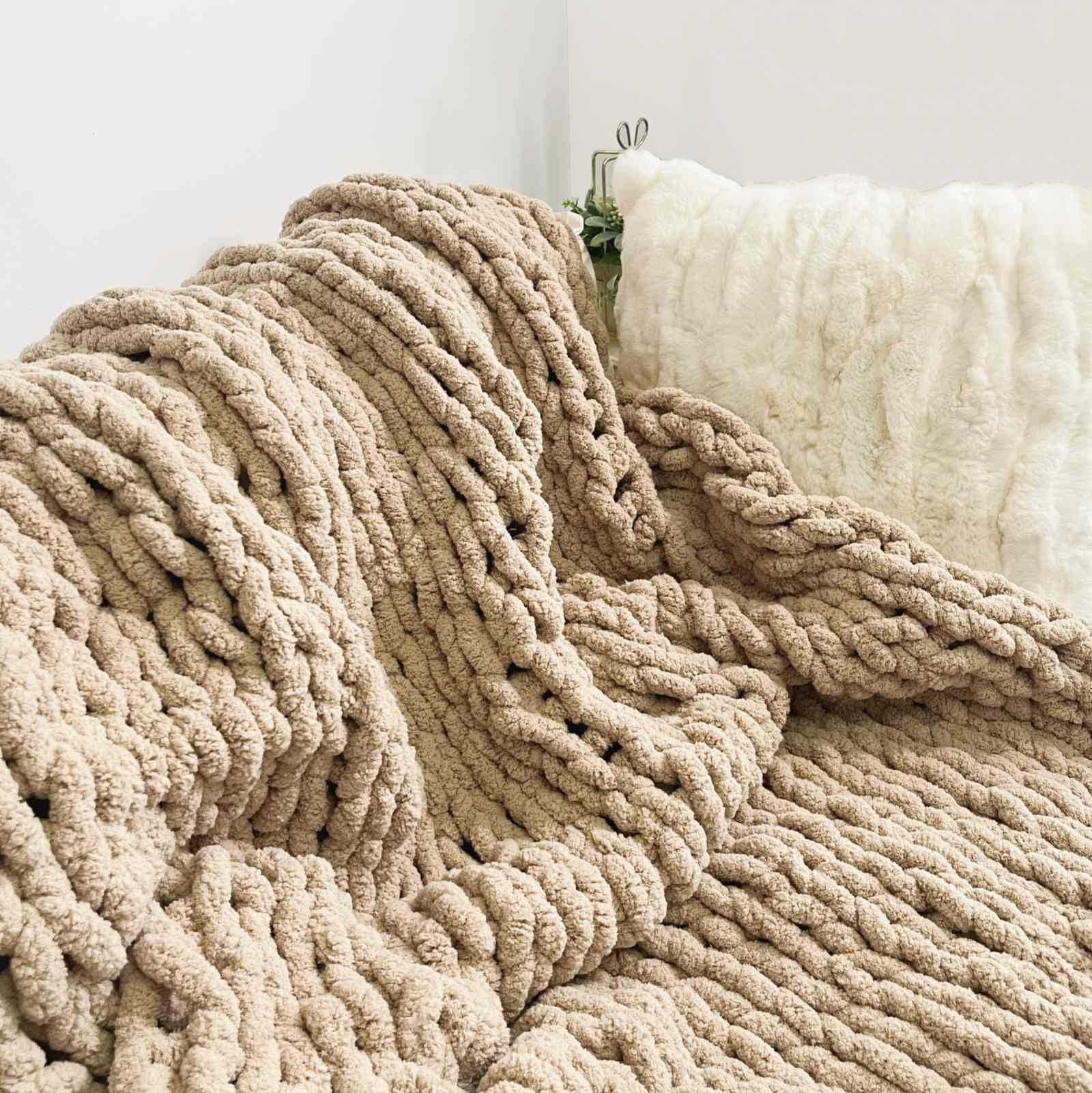 MocaDng throw draped over a couch showing warmth and instant room styling benefit