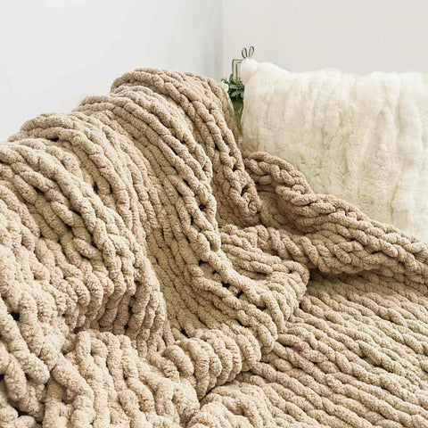MocaDng throw draped over a couch showing warmth and instant room styling benefit