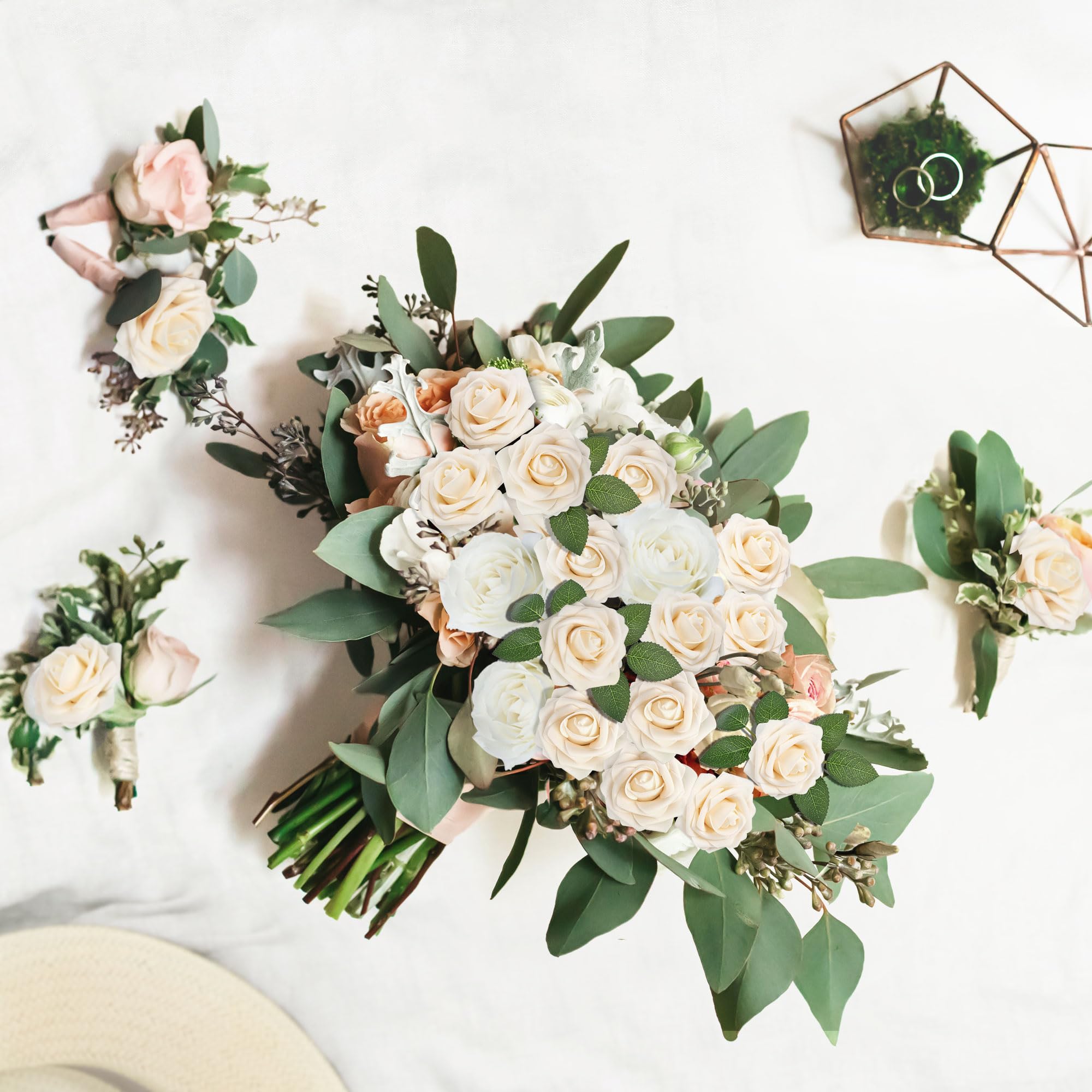 Mocoosy cream roses styled as a table centerpiece adding elegant ambiance