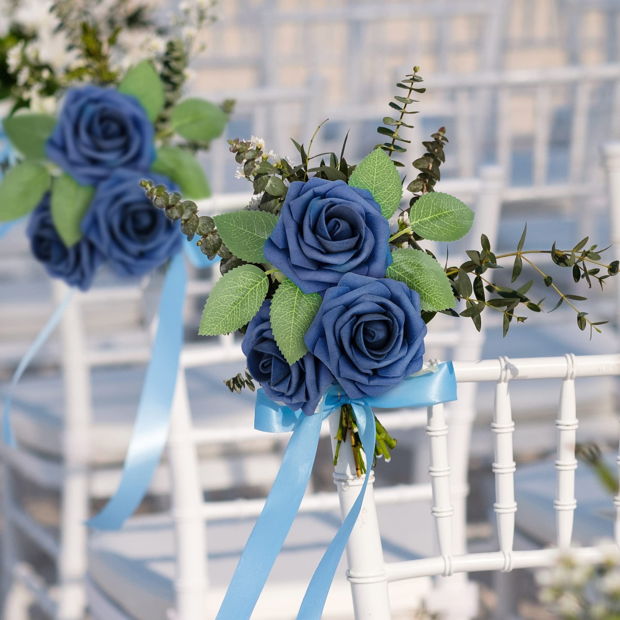Mocoosy table centerpiece with navy roses demonstrating event styling and contrast