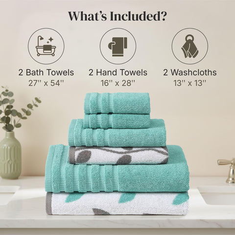 Modern Threads folded bath towels stacked to show plush thickness and neat storage