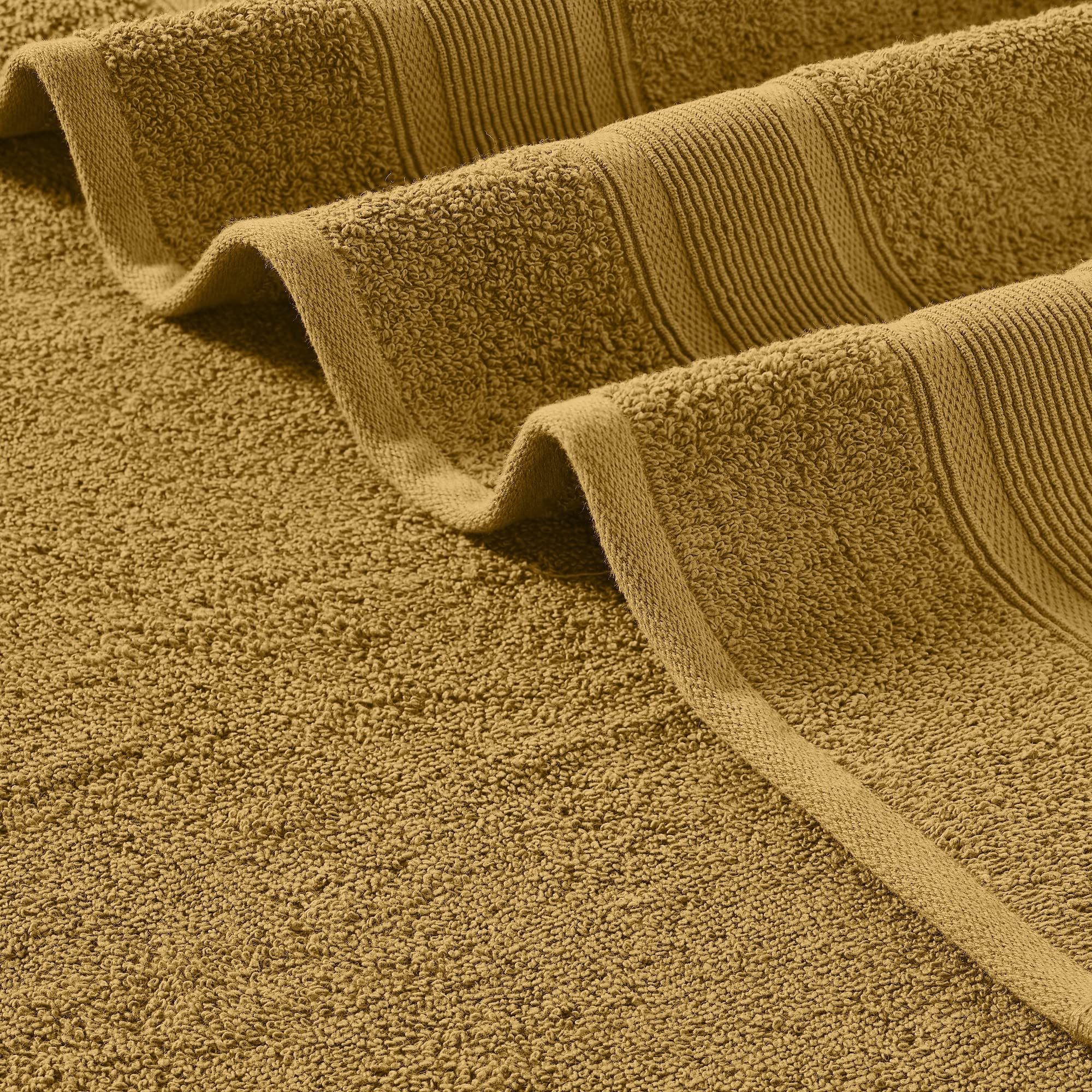 Modern Threads towels displayed in bathroom setting adding hotel-style warmth and decor appeal