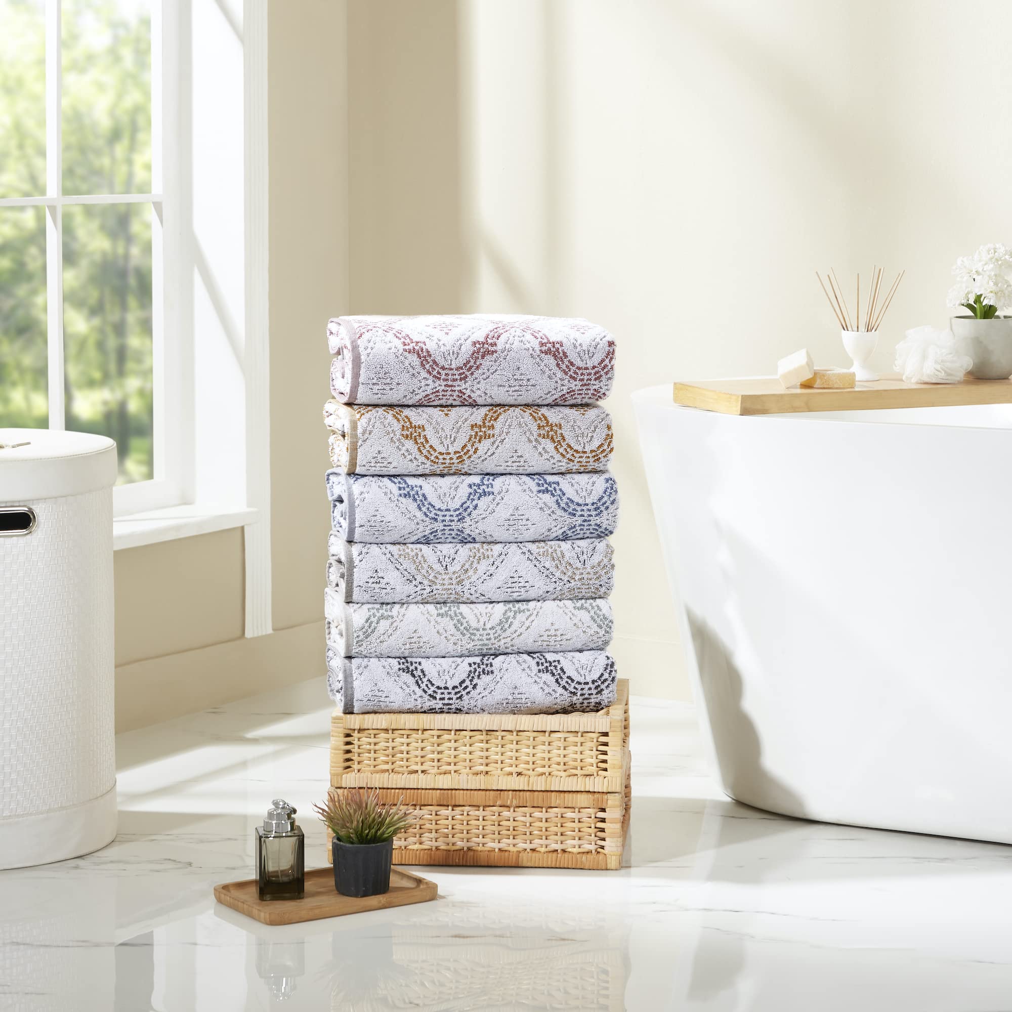 Modern Threads folded towels next to ruler showing dimensions and practical scale for storage