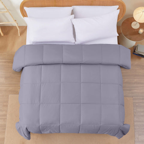 Modern Threads comforter styled on a twin bed for a modern bedroom