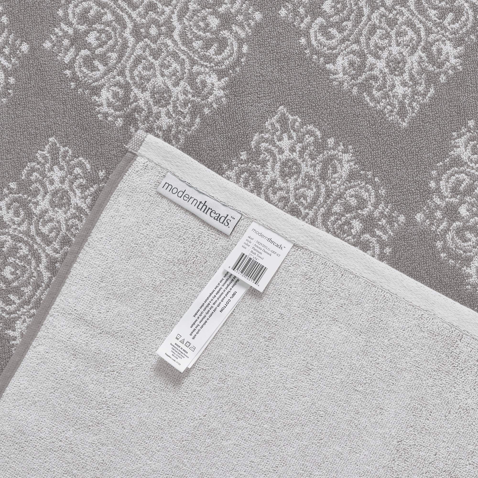 Modern Threads care label and stitching detail showing fabric fiber and easy-care benefits