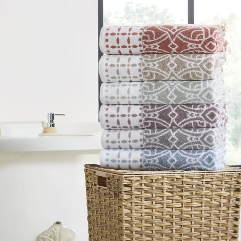 Modern Threads Monroe towels beside ruler showing sizes for bath, hand towel, and washcloth utility