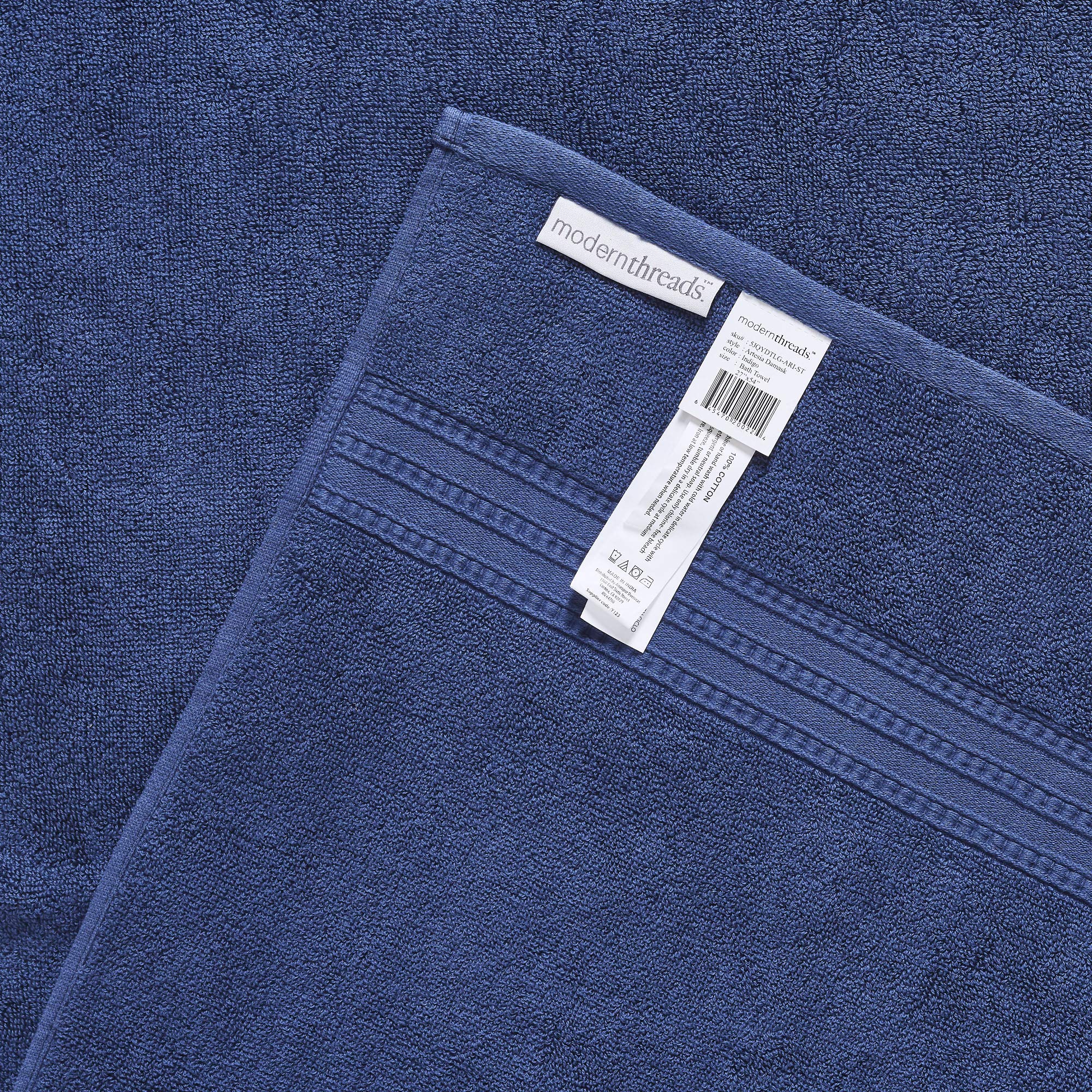 Modern Threads washcloth detail highlighting soft cotton feel and durability