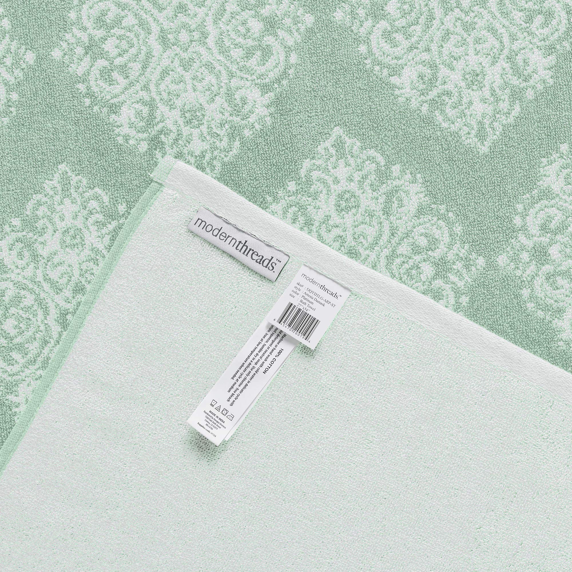Modern Threads laid-flat display of bath, hand, washcloth sizes for scale and practicality